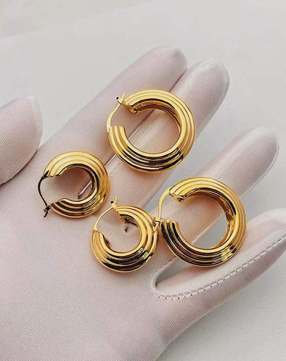 Large Cassie Ridge Hoop Earrings-Aurous Atelier-18 carat gold jewellery,18k gold earrings,18k gold jewellery,18k gold jewelry,chunky earrings,chunky hoops earrings,gold earring,gold earrings,gold hoop earrings,gold hoops,gold ridge hoops,minimalist,minimalist earrings,parisian style,ridge earrings,vintage earrings