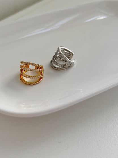 Architectural 4-band design of Aurelia gold cuff.
