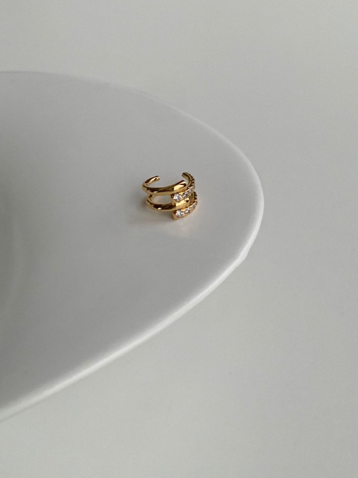 [Aurous Atelier] Mandy thick gold pave ear cuff with brilliant handset stones.