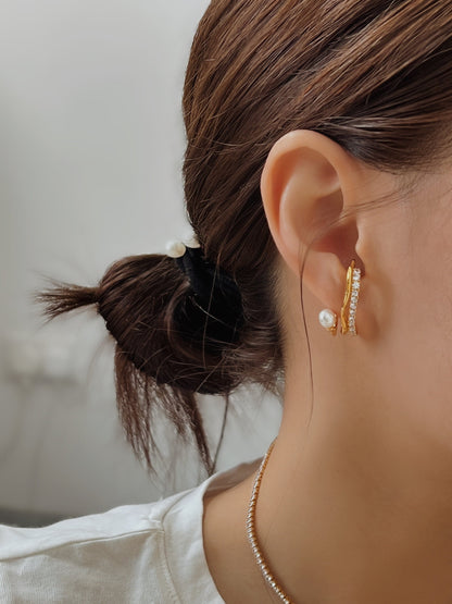 Ear stack styling with Cassidy gold pearl cuff.