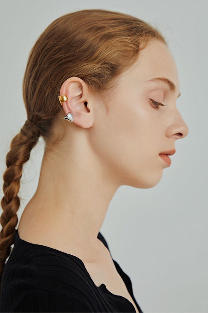 Ear stack styling with Jil bold gold cuff.