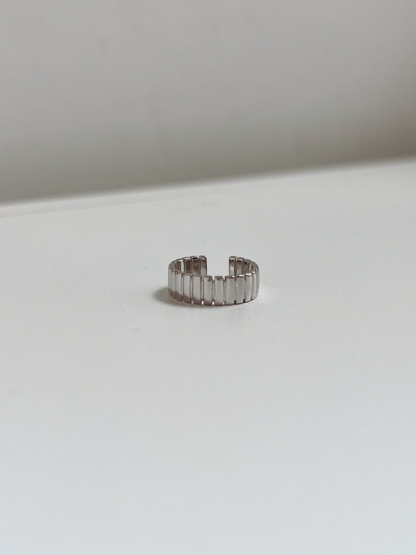 Front view of silver Kate ear cuffs