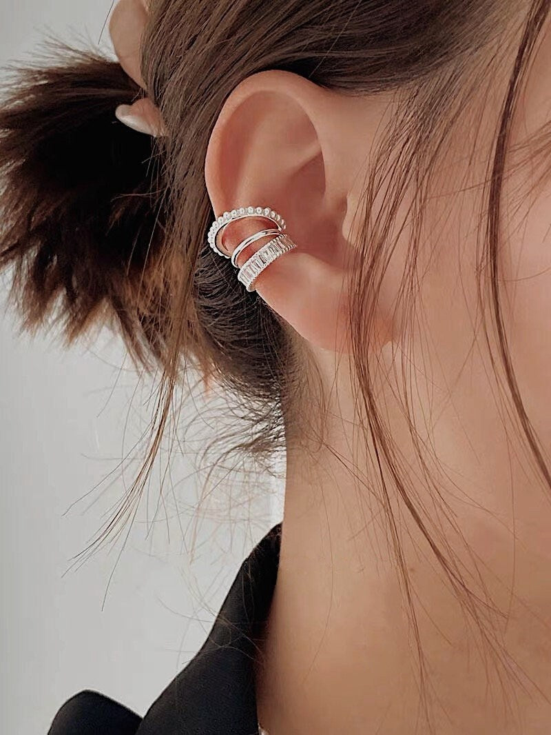 Model wearing Luxe Triple Ear Cuff for a daily office look.