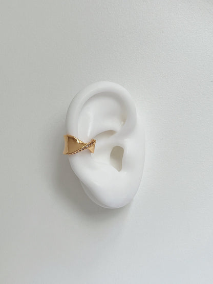 Product shot of Evelyn cuff on a silicone white ear.