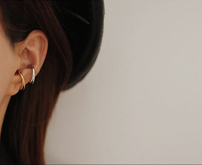 Model wearing the Leia Gold and Silver Cuff on the mid-helix for a daily look