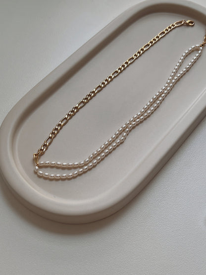 Delicate genuine freshwater seed pearls hand strung on a mixed metal statement chain