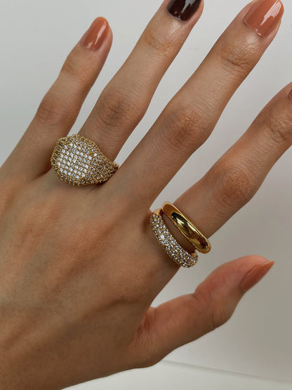 Close up of daily luxury gold ring styling for international travel