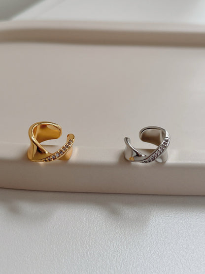 Evelyn sculptural ear cuff in gold and silver side-by-side.