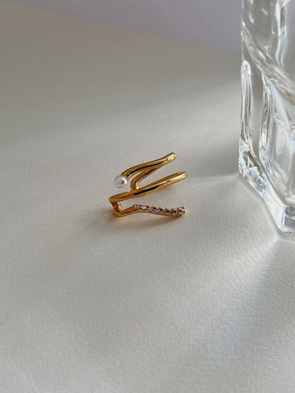 Heidi pearl and cz pavé ear cuff, gold, a chic addition to any jewelry collection.