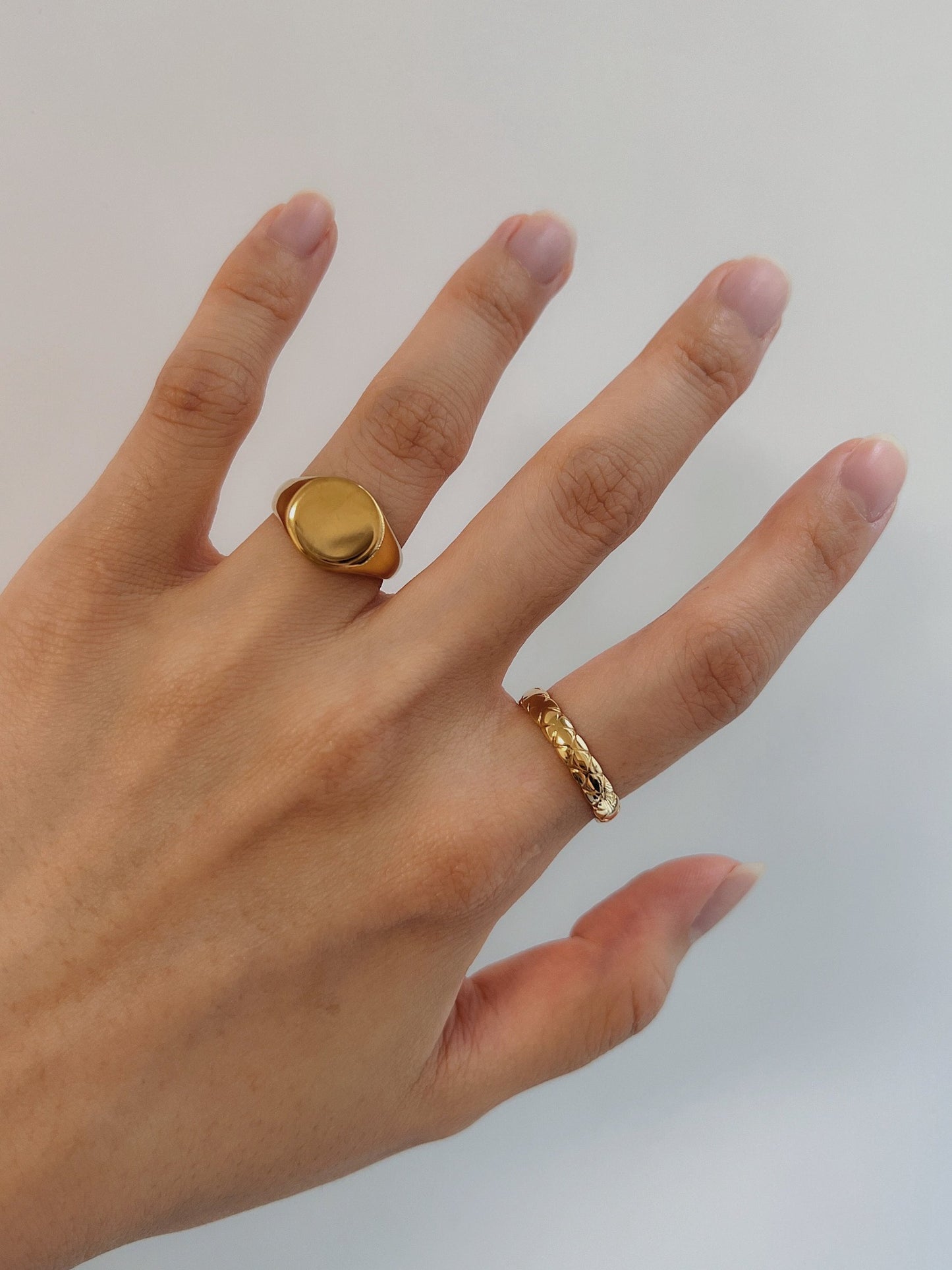 Unisex gold signet band by Aurous Atelier showing mirror finish