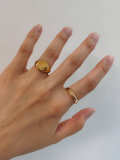 Unisex gold signet band by Aurous Atelier showing mirror finish