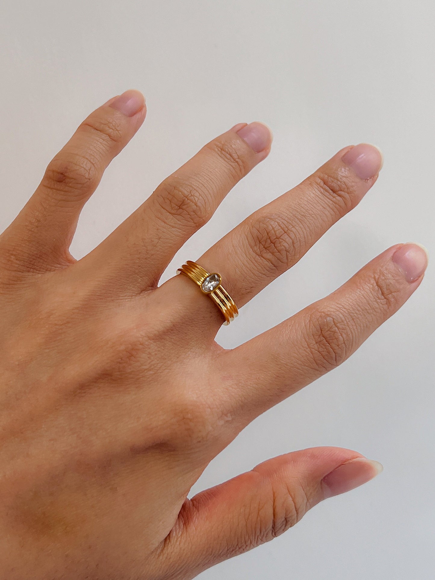 Hand model styling the Poppi ring as a standalone statement piece