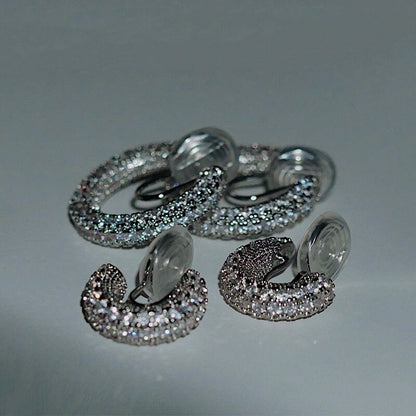 Size comparison between Small 15mm and Medium 22mm Jayne pavé CZ clip-on hoop earrings