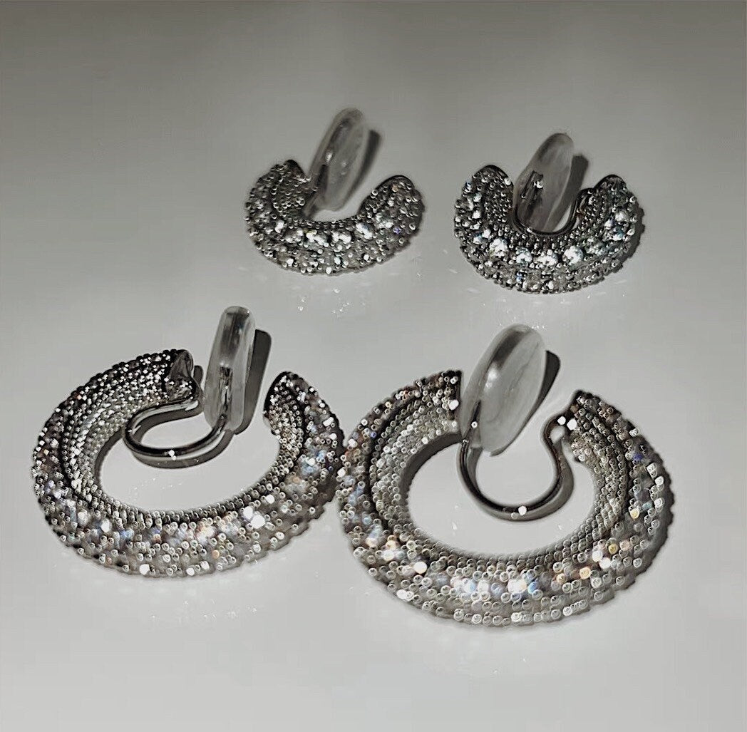Pair of Jayne rhodium clip-on hoop earrings featuring multi-row 5A cubic zirconia pavé setting