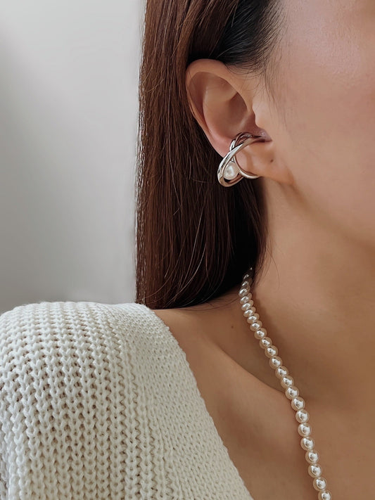 Model wearing silver Karolina Pearl Cuff for an asymmetrical look