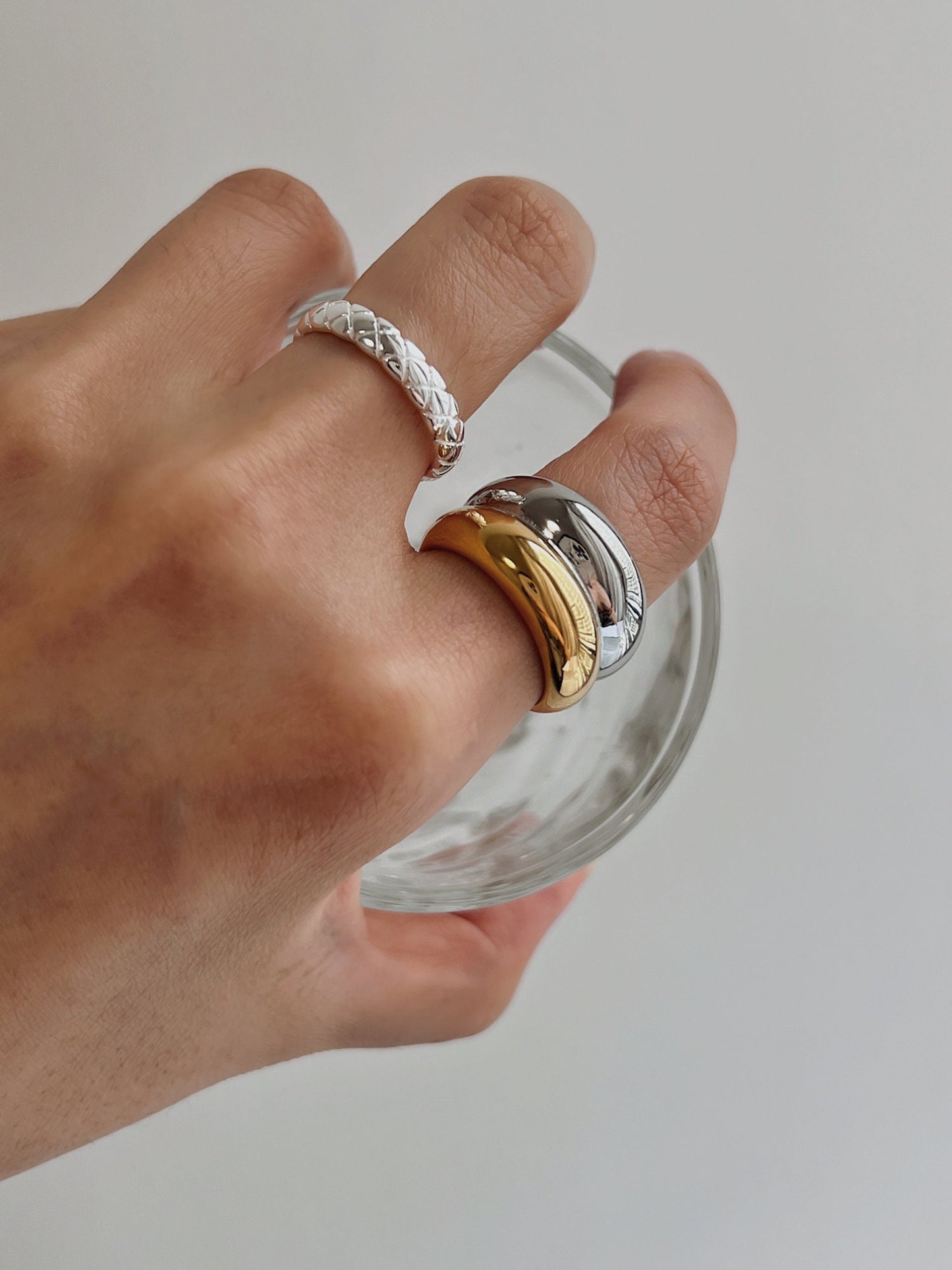 Aurous Atelier Brittany ring on hand model for a power stack aesthetic