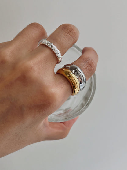 Aurous Atelier Brittany ring on hand model for a power stack aesthetic