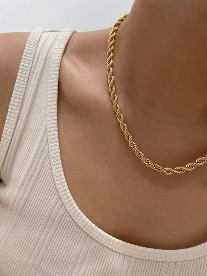 Close up of a woman wearing skin safe nickel free necklaces in rope design