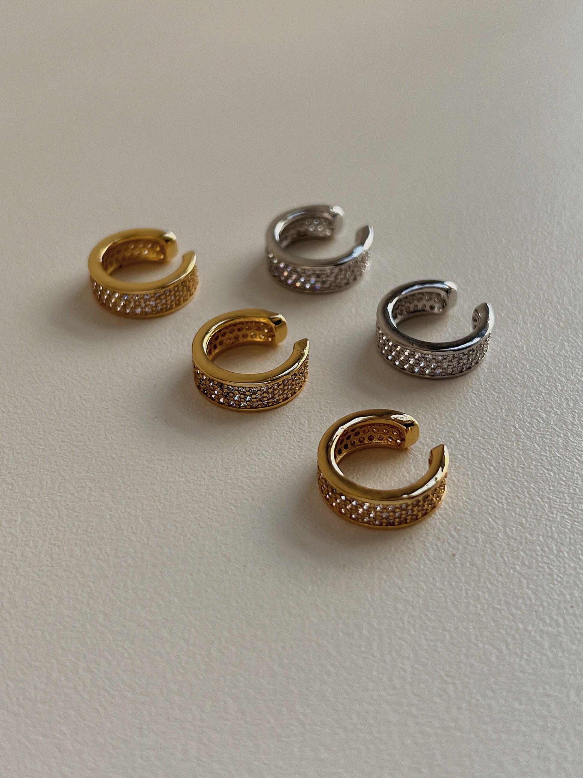 Priscilla Thick Pave Ear Cuff in 14K Gold and rhodium plated on white background.