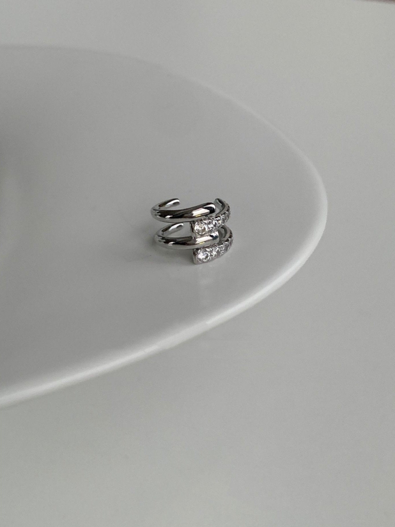 Close-up of the smooth, non-adjustable opening of the Mandy pave cuff.