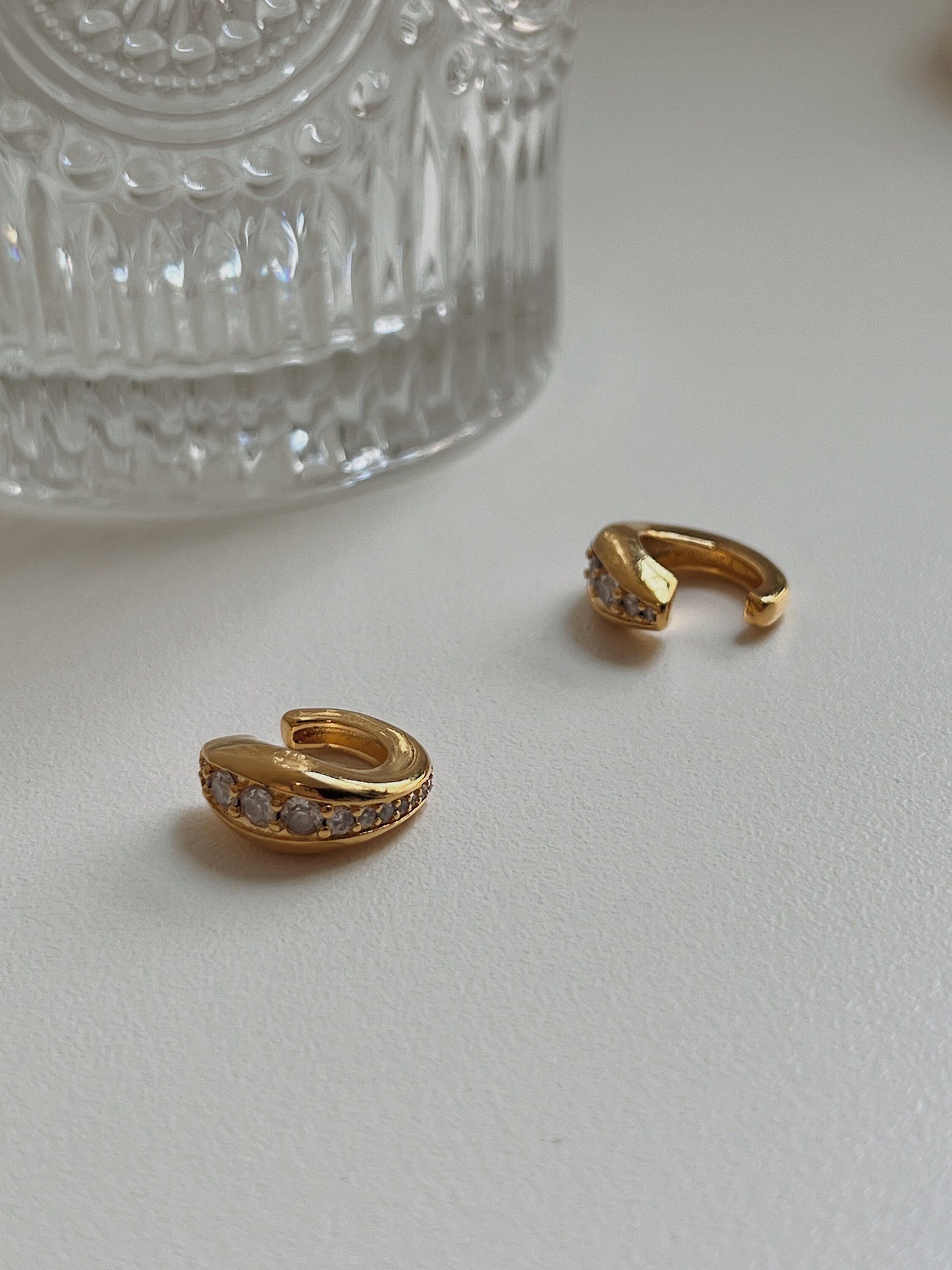 Macro shot of pavé cz stones on Marissa gold cuff.