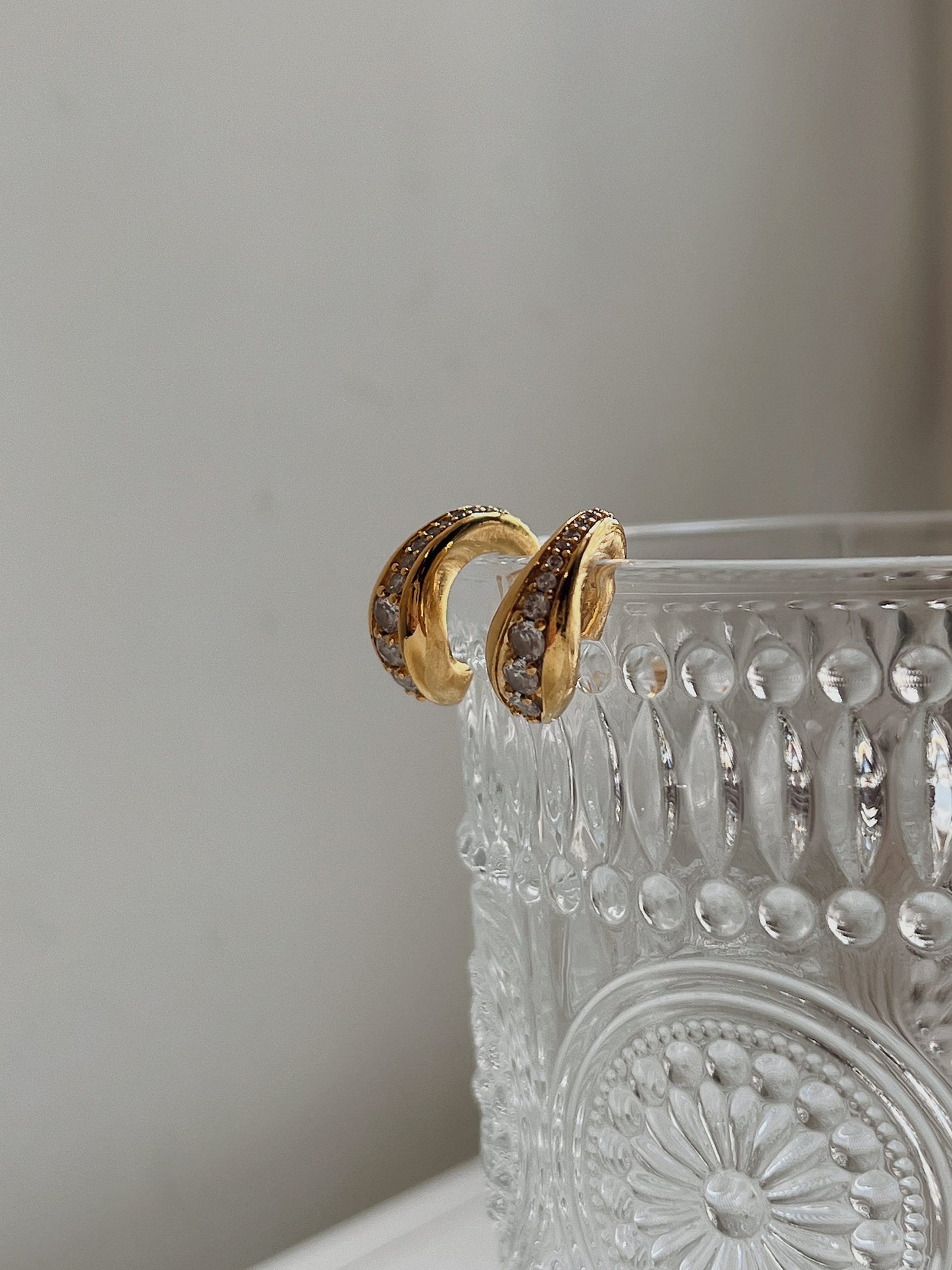 Side profile of Marissa channel-set gold ear cuff.