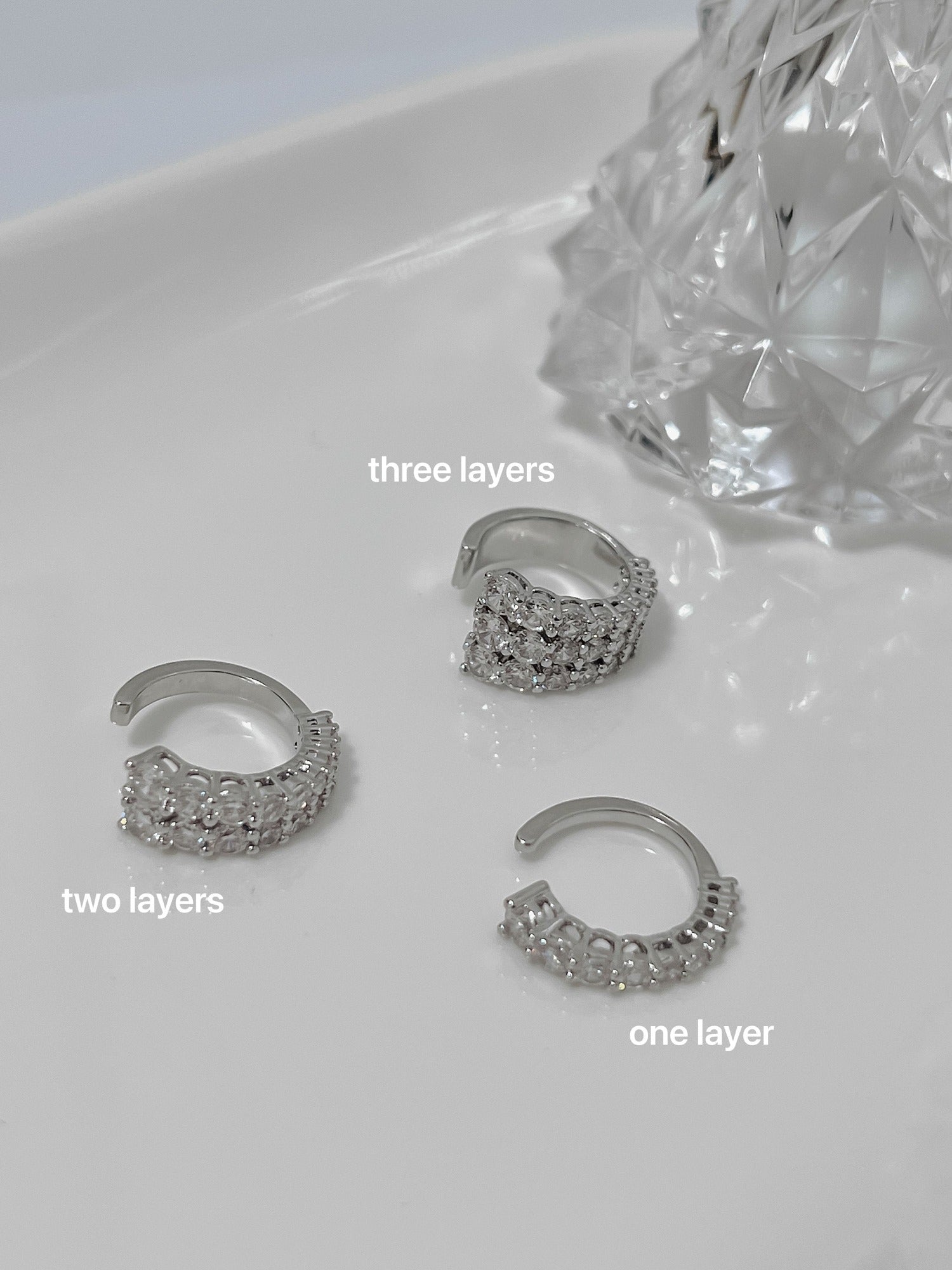 Emily Pavé Ear Cuff set in silver showing 1-layer, 2-layer, and 3-layer options
