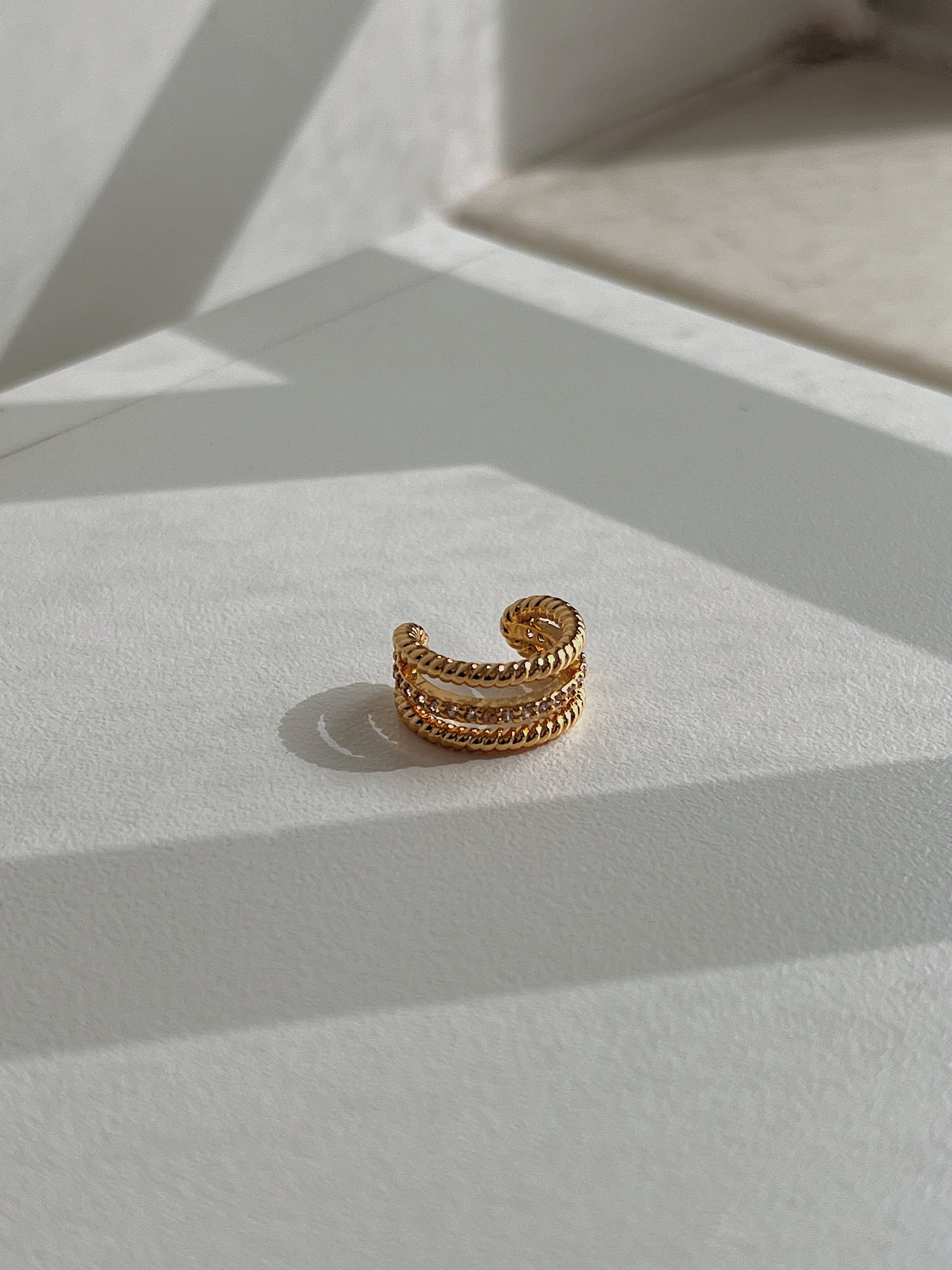 Architectural detail of Jennie triple band ear cuff.