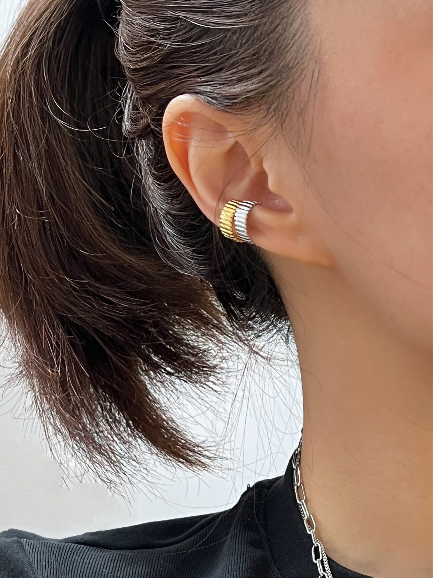 Ear stack styling featuring Kate gold and silver cuffs.