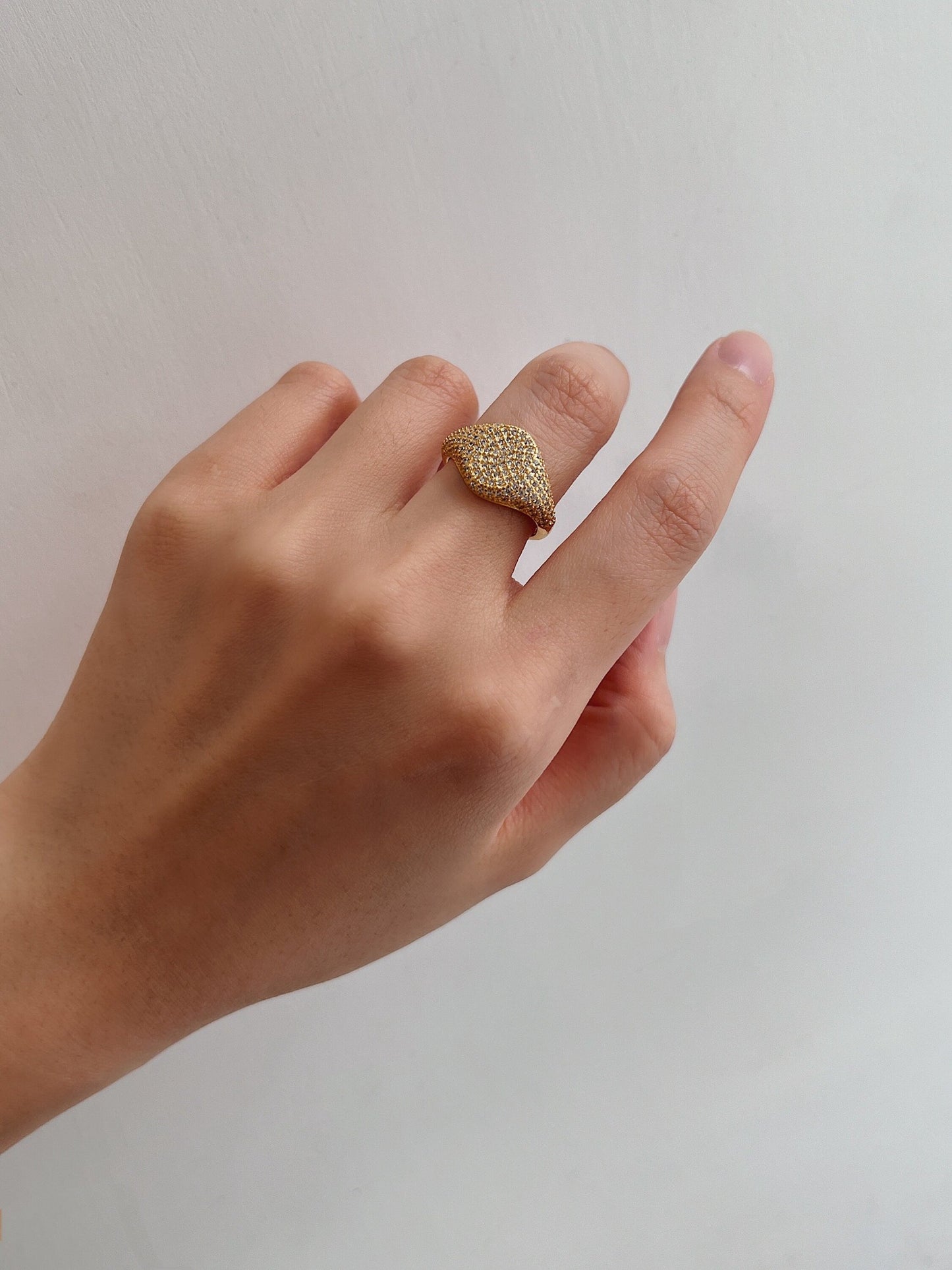 Close up of model's hand showing the comfortable fit of the Andrée ring.