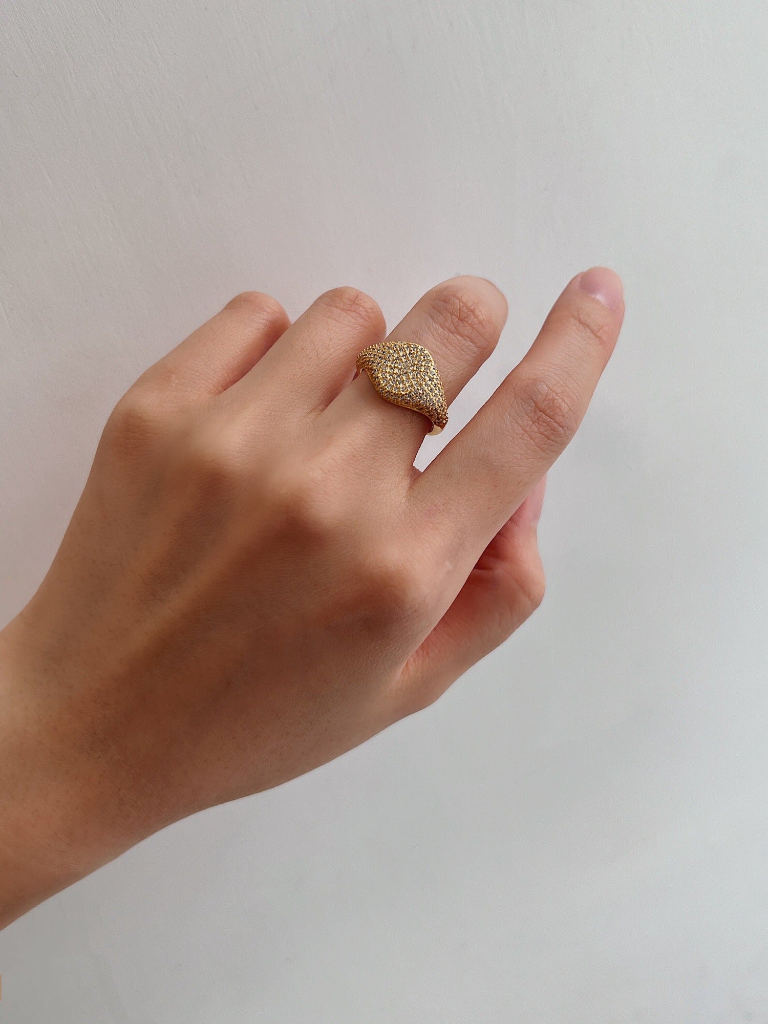 Close up of model's hand showing the comfortable fit of the Andrée ring.