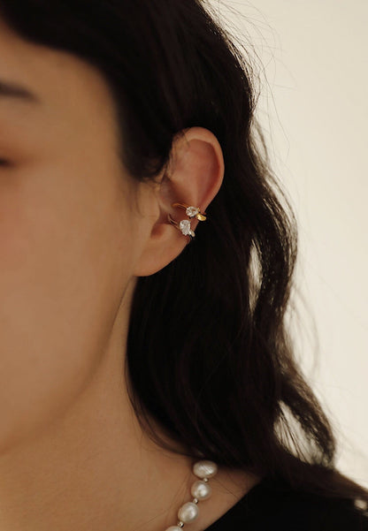 Model wearing both Gold and Silver Tiffany Cuffs for a stacked look
