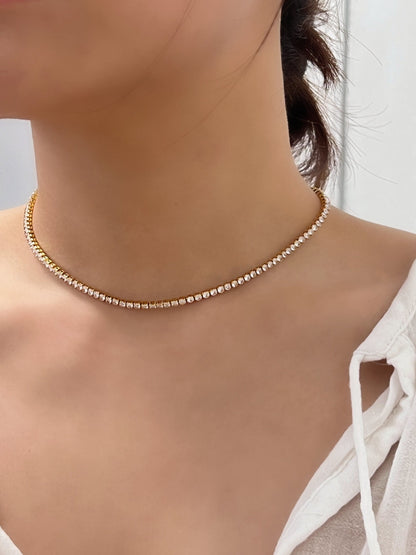 Model chest perspective styling the amelia fine tennis necklace with crisp clothing tailoring