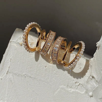 Triple ear cuff showcasing the beaded pearl band texture.