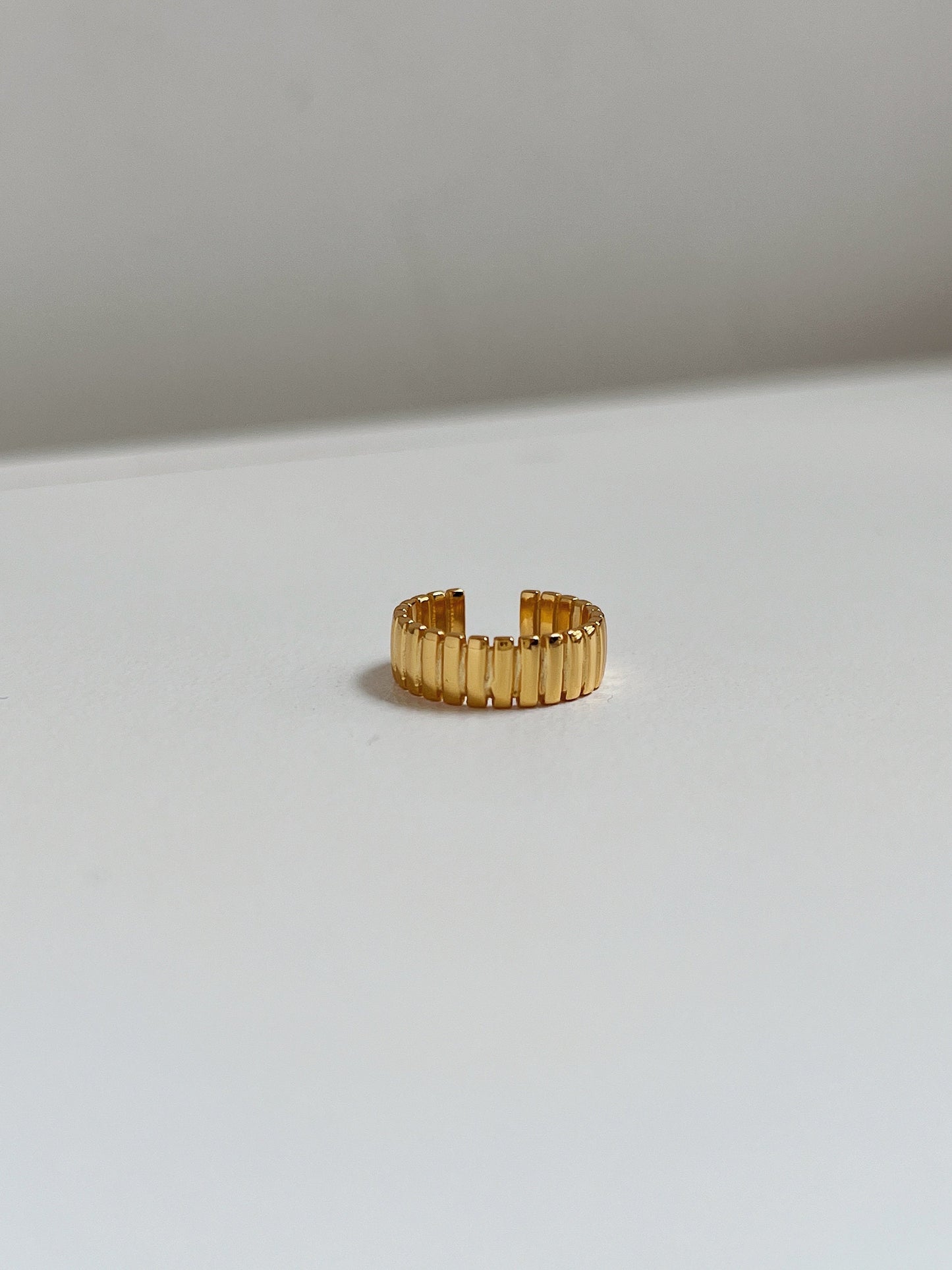Front view of gold Kate ear cuffs