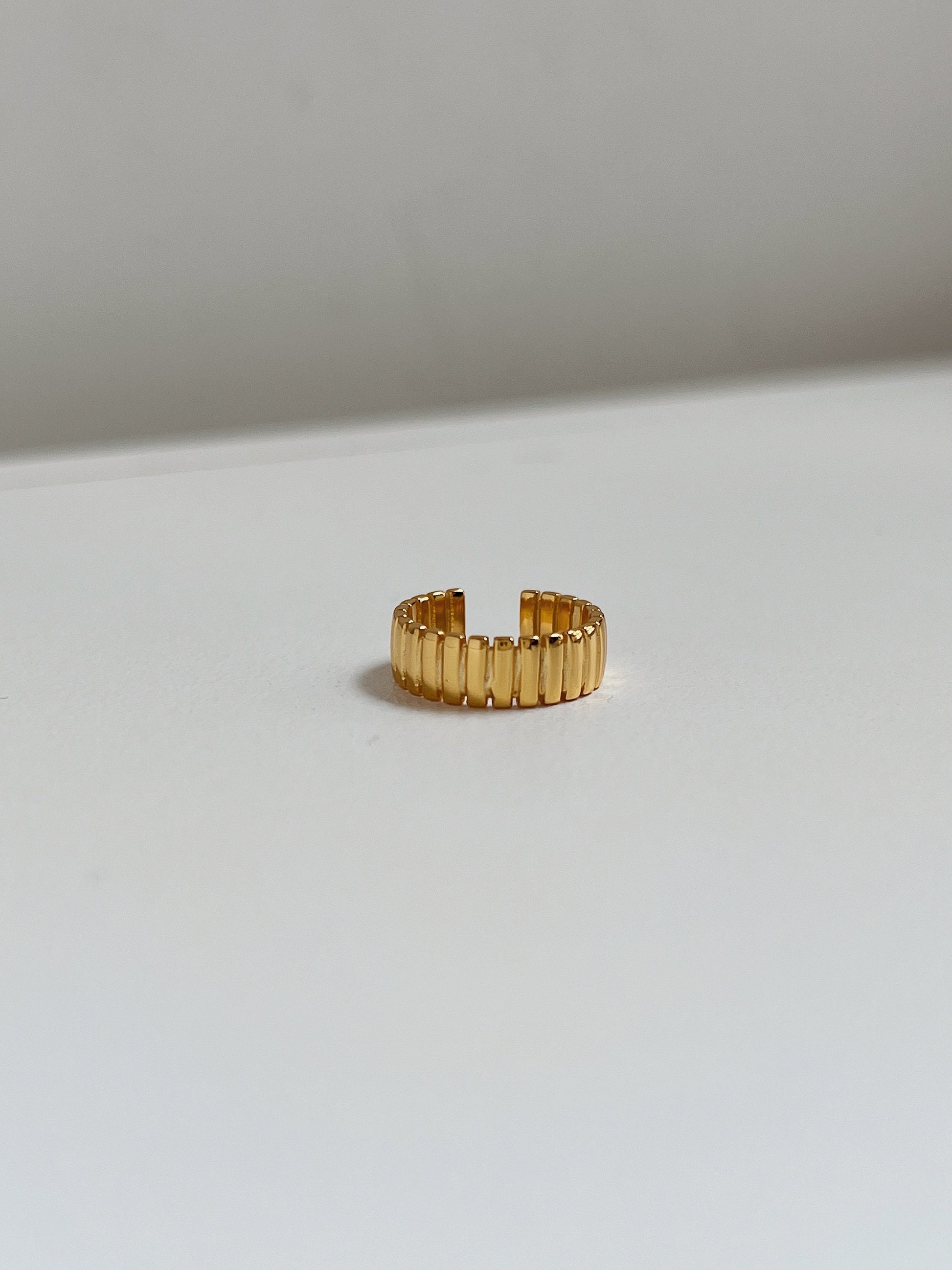 Front view of gold Kate ear cuffs