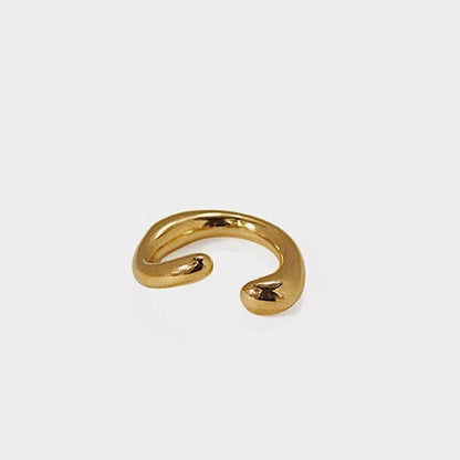 Close-up of the non-pierced Leia Gold Cuff with mirror-shine finish