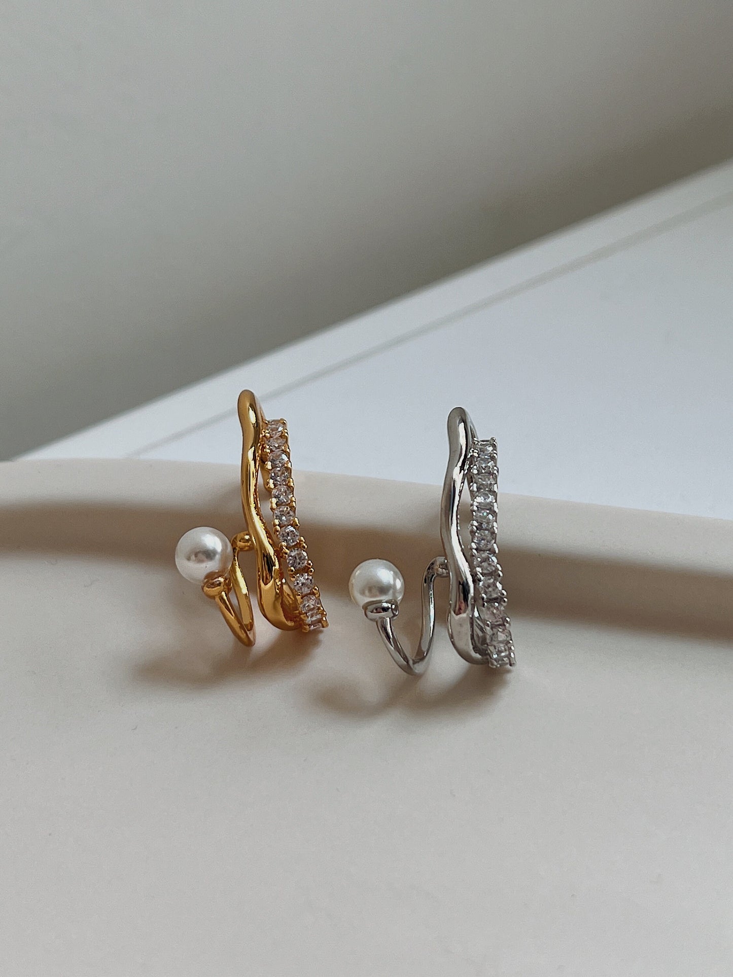 Close-up of pearl and diamond-look pavé stones.