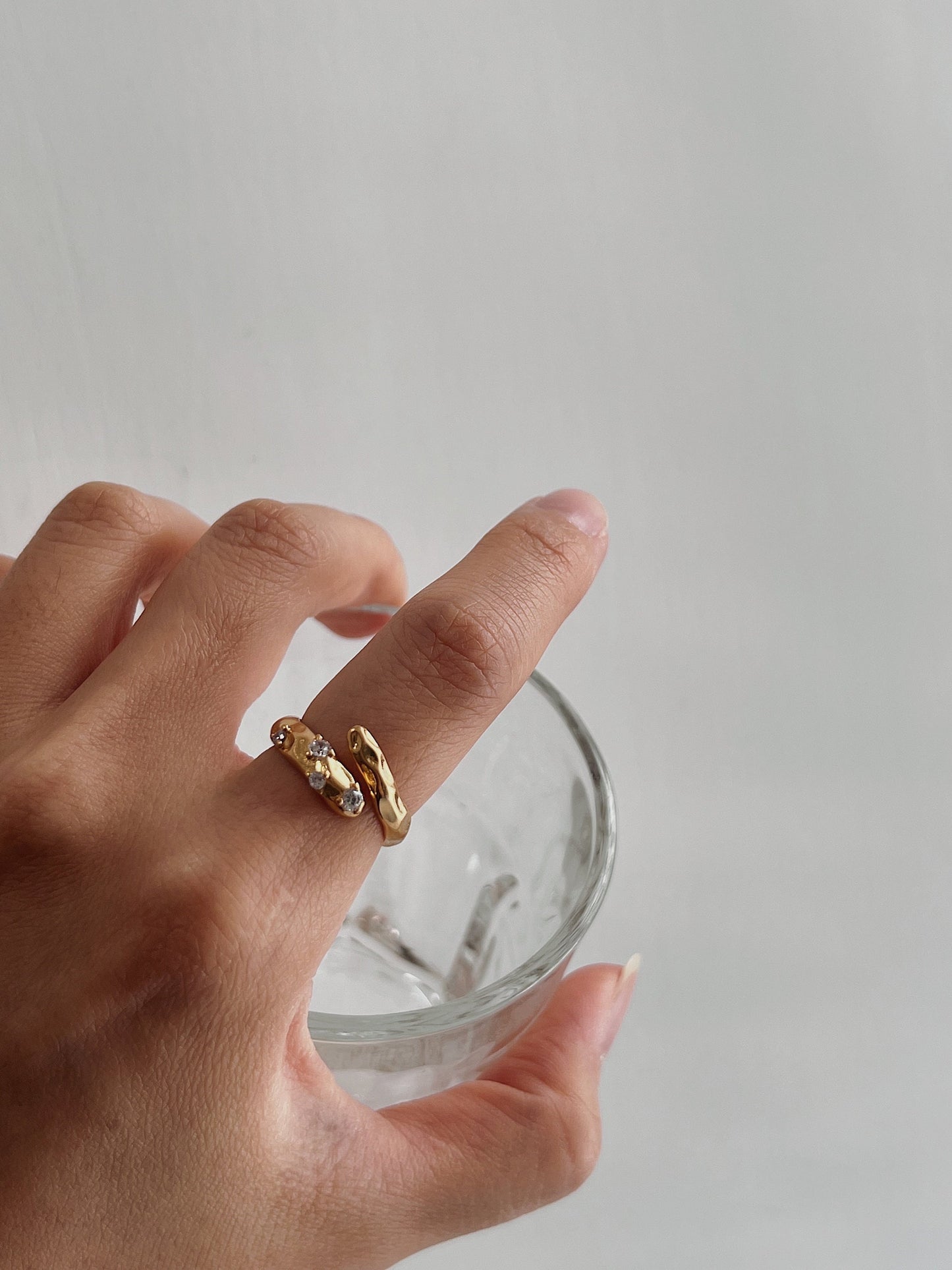 Aurous Atelier Doris ring on hand model for a quiet luxury aesthetic