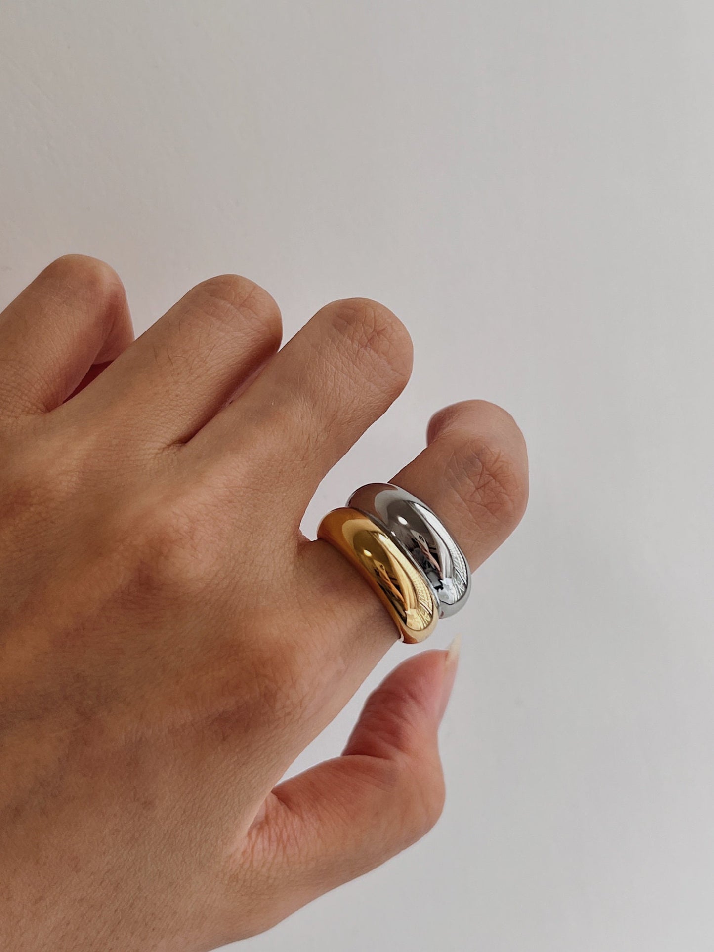Aurous Atelier Brittany ring on hand model for a power stack aesthetic