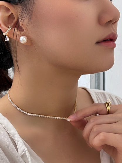 Close up of a professional woman wearing skin safe nickel free clear crystal jewelry