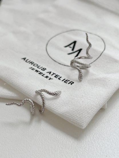 Top-down view of Victoria sculptural silver ear cuff.