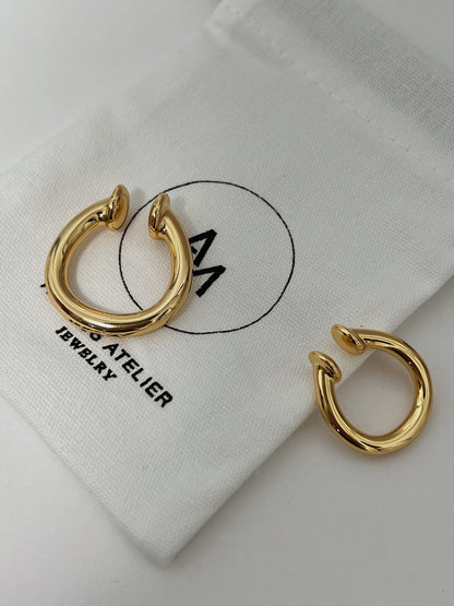2 small and large Gold Brooklyn Cuffs showing the 2026 bold sculptural trend