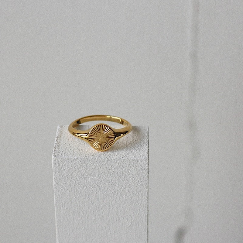 Tarnish resistant 18k gold signet ring for ocean swimming