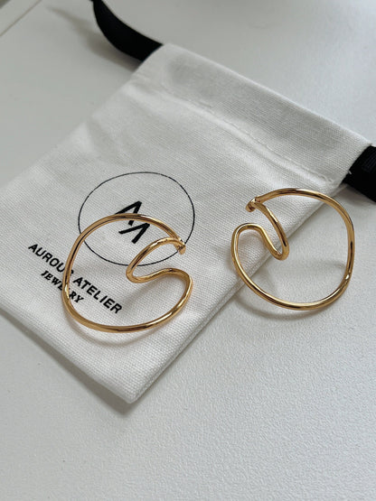 Kendra Gold Ear Cuff showcasing the high-polish mirror finish.