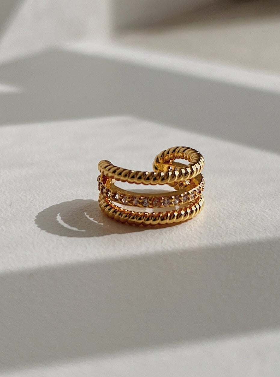 Front view of Jennie cuff, high-shine gold finish.