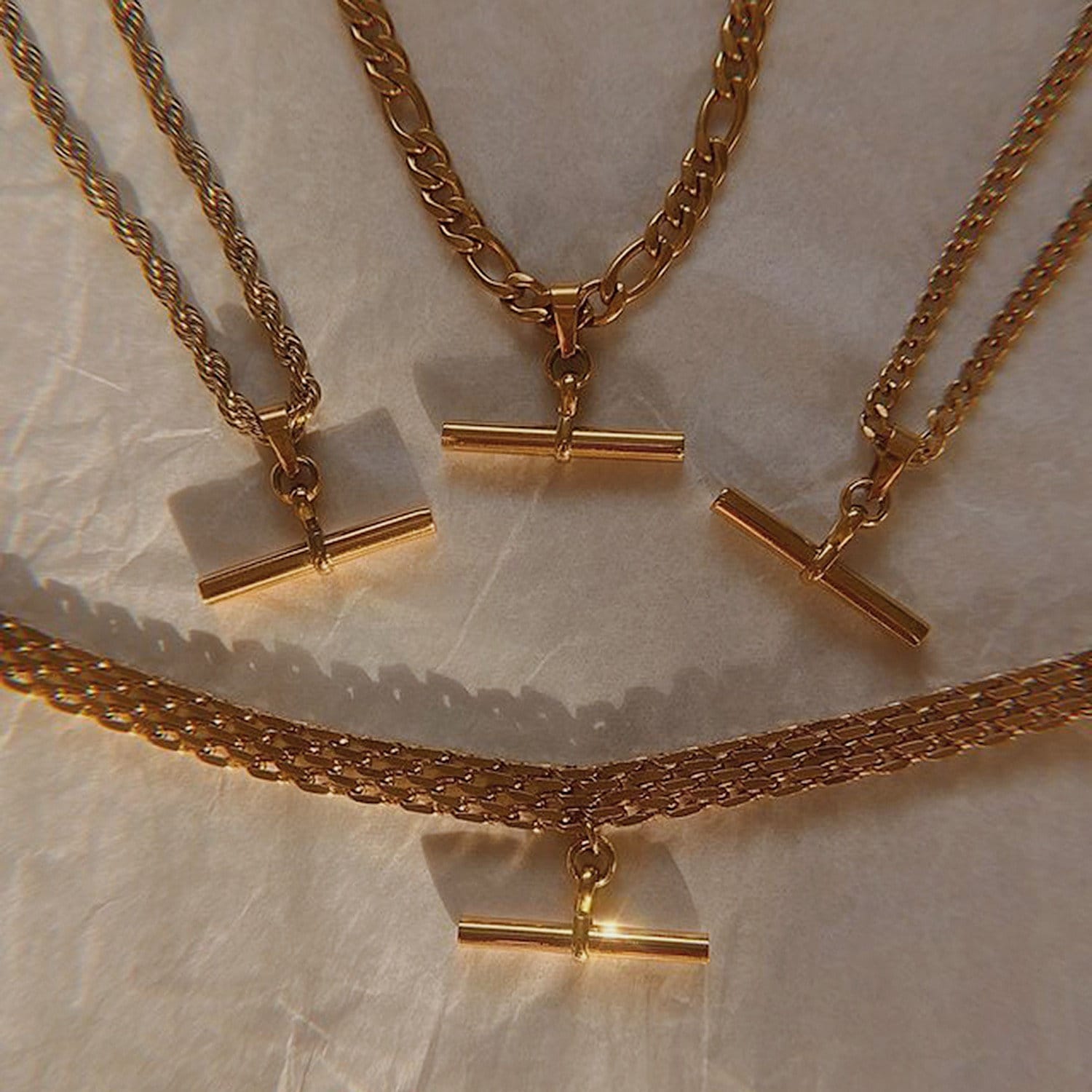 Flat lay of premium tarnish resistant stainless steel link chain showing different chain texture