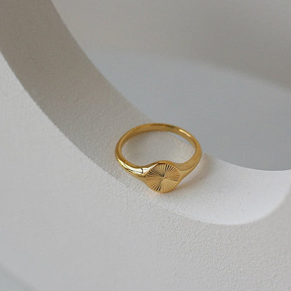 Waterproof gold celestial signet ring by Aurous Atelier